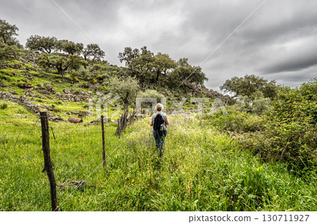 Portalegre, Portugal - Apr 06, 2025: Hiking a walking route at Portalegre, Portugal. Percurso Pedestre de Galegos Portalegre, Portugal - Apr 06, 2025: Hiking a walking route at Portalegre, Portugal. Percurso Pedestre de Galegos 130711927