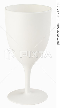 A white, opaque wine glass with a modern design stands on a white background, ready for use. 130712148