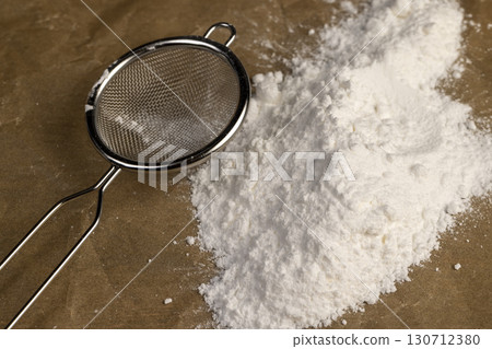 white powdered sugar made from ground beet sugar, white crumbly powdered sugar made from natural beetroot is used in cooking 130712380