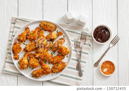 Panko breaded oven baked chicken wings on plate Panko breaded oven baked chicken wings on plate 130712435
