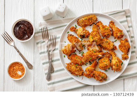 Panko breaded oven baked chicken wings on plate Panko breaded oven baked chicken wings on plate 130712439