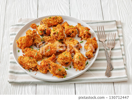 Panko breaded oven baked chicken wings on plate Panko breaded oven baked chicken wings on plate 130712447