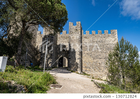 Moorish Sesimbra castle with walls and wall walk in Sesimbra, Portugal Moorish Sesimbra castle with walls and wall walk in Sesimbra, Portugal 130712824