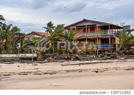 Colorful natural-framed houses with balconies at Pesqueiro, Soure in Marajo Island, Brazil. Colorful natural-framed houses with balconies at Pesqueiro, Soure in Marajo Island, Brazil. 130712892