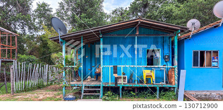 Colorful natural-framed houses with balconies at Pesqueiro, Soure in Marajo Island, Brazil. 130712900