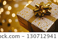 A beautifully wrapped gift box sits against a sparkling background filled with festive colors, highlighting the joy and excitement of welcoming the New Year. 130712941