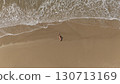 Pregnant Woman Relaxing by the Ocean Aerial Beach Photography 130713169