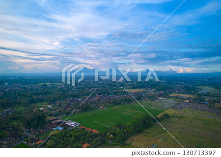 Panorama of Mount Agung and rice fields on the island of Bali. Panorama of Mount Agung and rice fields on the island of Bali. 130713397