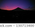 Silhouette of the Agung volcano at sunset. Panorama of the mountain on the island of Bali. 130713400