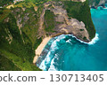 Cinematic aerial landscape shots of the beautiful island dinosaur of Nusa Penida. Huge cliffs by the shoreline and hidden dream beaches with clear water. 130713405