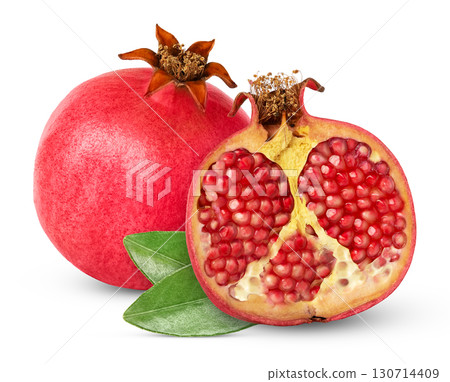 Fresh pink pomegranate and cut in a half with green leaves isolated with clipping path. Fresh pink pomegranate and cut in a half with green leaves isolated with clipping path. 130714409