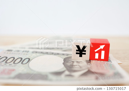 Yen symbol and graph showing the appreciation of the yen and the rise in Japanese stocks. 130715017