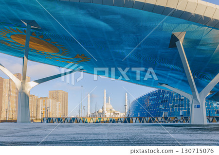 Modern architectural urbanistic city Astana. Futuristic buildings, mosque, Nur-Sultan, Astana, Kazakhstan. High quality photo Modern architectural urbanistic city Astana. Futuristic buildings, mosque, Nur-Sultan, Astana, Kazakhstan. High quality photo 130715076