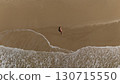 Pregnant Woman Relaxing by the Ocean Aerial Beach Photography 130715550