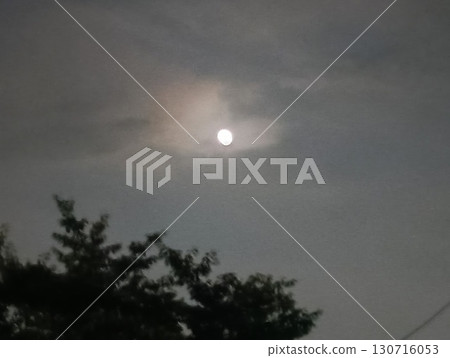 A light of hope floating in the night sky 130716053