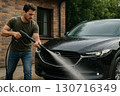 Man washing a car 0035 130716349