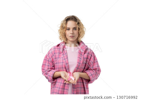 Person presents a pink gift box with ribbon, isolated on white, PNG Person presents a pink gift box with ribbon, isolated on white, PNG 130716992