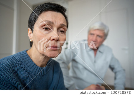 Close up depressed sad woman in quarrel with husband. Female turned away in emotional withdrawal 130718878