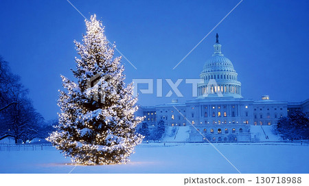 Snow Covered Capitol Building with Brightly Lit Christmas Tree at Night 130718988