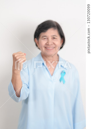 Elderly with blue Ribbon for concept of blue November, November Prostate Cancer Awareness month, World Diabetes day , Men Health month, International men, Father day. Healthcare and world cancer day 130720099