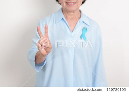 Elderly with blue Ribbon for concept of blue November, November Prostate Cancer Awareness month, World Diabetes day , Men Health month, International men, Father day. Healthcare and world cancer day 130720103