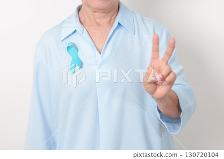 Elderly with blue Ribbon for concept of blue November, November Prostate Cancer Awareness month, World Diabetes day , Men Health month, International men, Father day. Healthcare and world cancer day 130720104