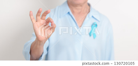 Elderly with blue Ribbon for concept of blue November, November Prostate Cancer Awareness month, World Diabetes day , Men Health month, International men, Father day. Healthcare and world cancer day 130720105