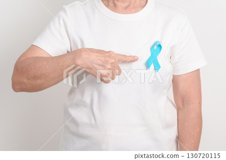 Elderly with blue Ribbon for concept of blue November, November Prostate Cancer Awareness month, World Diabetes day , Men Health month, International men, Father day. Healthcare and world cancer day 130720115