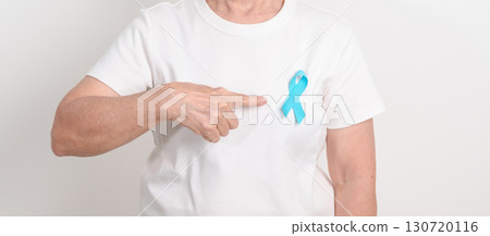Elderly with blue Ribbon for concept of blue November, November Prostate Cancer Awareness month, World Diabetes day , Men Health month, International men, Father day. Healthcare and world cancer day Elderly with blue Ribbon for concept of blue November, November Prostate Cancer Awareness month, World Diabetes day , Men Health month, International men, Father day. Healthcare and world cancer day 130720116