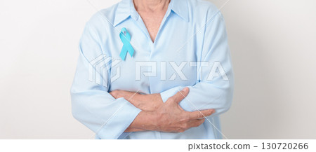 Elderly with blue Ribbon for concept of blue November, November Prostate Cancer Awareness month, World Diabetes day , Men Health month, International men, Father day. Healthcare and world cancer day Elderly with blue Ribbon for concept of blue November, November Prostate Cancer Awareness month, World Diabetes day , Men Health month, International men, Father day. Healthcare and world cancer day 130720266