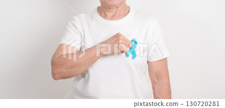 Elderly with blue Ribbon for concept of blue November, November Prostate Cancer Awareness month, World Diabetes day , Men Health month, International men, Father day. Healthcare and world cancer day 130720281