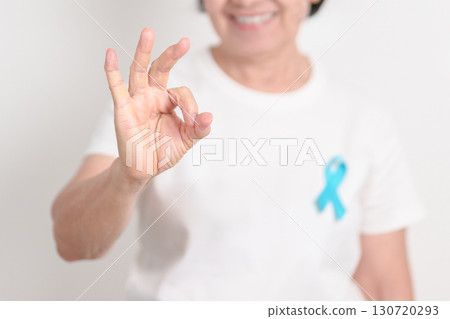 Elderly with blue Ribbon for concept of blue November, November Prostate Cancer Awareness month, World Diabetes day , Men Health month, International men, Father day. Healthcare and world cancer day Elderly with blue Ribbon for concept of blue November, November Prostate Cancer Awareness month, World Diabetes day , Men Health month, International men, Father day. Healthcare and world cancer day 130720293