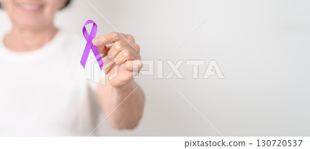 Elderly with Purple Ribbon for Violence, Pancreatic, Esophageal, Testicular cancer, Alzheimer, Epilepsy, Lupus, Crohn, Thyroid, Sarcoidosis and Fibromyalgia. Awareness month and World cancer day Elderly with Purple Ribbon for Violence, Pancreatic, Esophageal, Testicular cancer, Alzheimer, Epilepsy, Lupus, Crohn, Thyroid, Sarcoidosis and Fibromyalgia. Awareness month and World cancer day 130720537