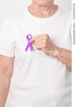 Elderly with Purple Ribbon for Violence, Pancreatic, Esophageal, Testicular cancer, Alzheimer, Epilepsy, Lupus, Crohn, Thyroid, Sarcoidosis and Fibromyalgia. Awareness month and World cancer day Elderly with Purple Ribbon for Violence, Pancreatic, Esophageal, Testicular cancer, Alzheimer, Epilepsy, Lupus, Crohn, Thyroid, Sarcoidosis and Fibromyalgia. Awareness month and World cancer day 130720539