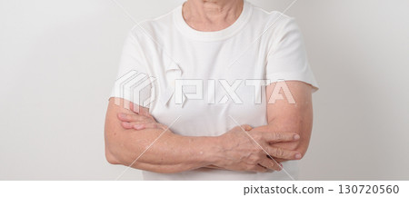 Elderly with White ribbon for concept November Lung Cancer Awareness month, Stop Violence Against Women, Adoption, May Retinoblastoma, Action for Women Health, March Remembrance, October Osteoporosis 130720560