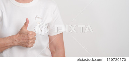 Elderly with White ribbon for concept November Lung Cancer Awareness month, Stop Violence Against Women, Adoption, May Retinoblastoma, Action for Women Health, March Remembrance, October Osteoporosis 130720570