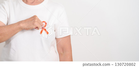 Elderly with Orange Ribbon for Leukemia, Kidney cancer day, Multiple Sclerosis, Self Injury Awareness month, Hunger action, Complex Regional Pain Syndrome, Gun Violence, Agent Orange, Work Zone safety Elderly with Orange Ribbon for Leukemia, Kidney cancer day, Multiple Sclerosis, Self Injury Awareness month, Hunger action, Complex Regional Pain Syndrome, Gun Violence, Agent Orange, Work Zone safety 130720802