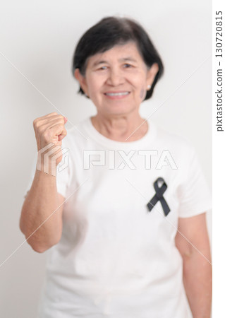 Elderly with Black ribbon for May Melanoma and skin cancer Awareness month, October Vaccine injury awareness month, Mourning Remembrance, March Sleep awareness week, Gang Prevention and Anti Violence Elderly with Black ribbon for May Melanoma and skin cancer Awareness month, October Vaccine injury awareness month, Mourning Remembrance, March Sleep awareness week, Gang Prevention and Anti Violence 130720815