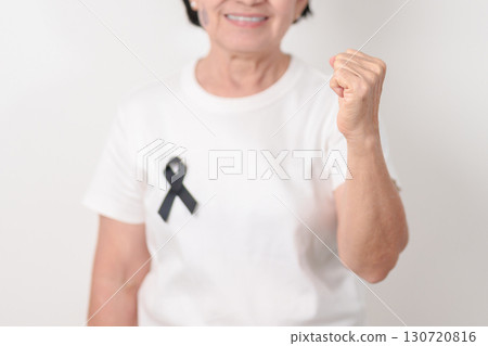 Elderly with Black ribbon for May Melanoma and skin cancer Awareness month, October Vaccine injury awareness month, Mourning Remembrance, March Sleep awareness week, Gang Prevention and Anti Violence Elderly with Black ribbon for May Melanoma and skin cancer Awareness month, October Vaccine injury awareness month, Mourning Remembrance, March Sleep awareness week, Gang Prevention and Anti Violence 130720816