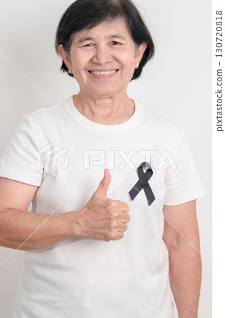 Elderly with Black ribbon for May Melanoma and skin cancer Awareness month, October Vaccine injury awareness month, Mourning Remembrance, March Sleep awareness week, Gang Prevention and Anti Violence Elderly with Black ribbon for May Melanoma and skin cancer Awareness month, October Vaccine injury awareness month, Mourning Remembrance, March Sleep awareness week, Gang Prevention and Anti Violence 130720818