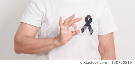 Elderly with Black ribbon for May Melanoma and skin cancer Awareness month, October Vaccine injury awareness month, Mourning Remembrance, March Sleep awareness week, Gang Prevention and Anti Violence Elderly with Black ribbon for May Melanoma and skin cancer Awareness month, October Vaccine injury awareness month, Mourning Remembrance, March Sleep awareness week, Gang Prevention and Anti Violence 130720819