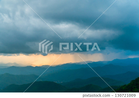 Landscape of Morning Mist with Mountain Layer. mountain ridge and clouds in rural jungle bush forest Landscape of Morning Mist with Mountain Layer. mountain ridge and clouds in rural jungle bush forest 130721009