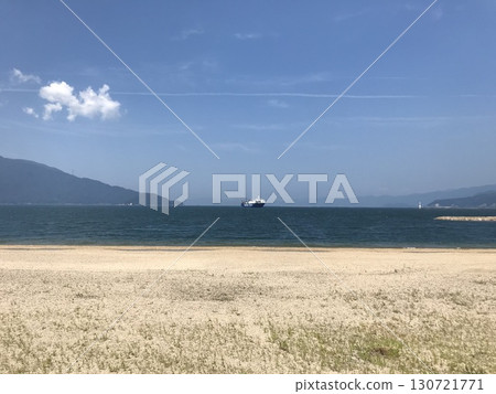 Sandy beach and ship 130721771