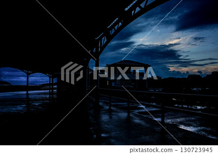 <Material> Tent at a campsite on a rainy evening <Material> Tent at a campsite on a rainy evening 130723945
