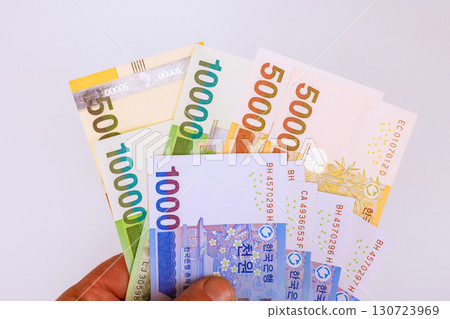 South Korean won currency notes are displayed, showcasing various denominations colorful designs. 130723969