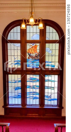 Beautiful stained glass in a French Western-style building Beautiful stained glass in a French Western-style building 130724898