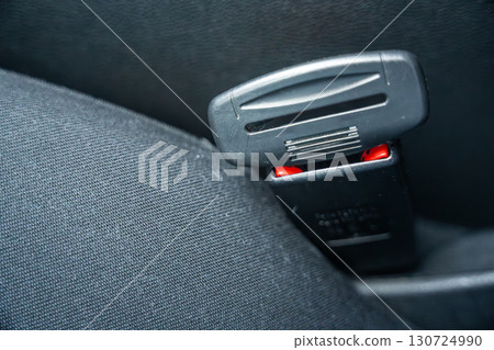 Artificial seat belt plug.Violation of traffic rules. Irresponsible driving and behavior concept 130724990
