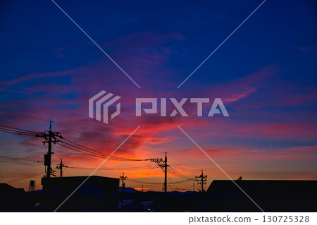 A bright red sunset in the west A bright red sunset in the west 130725328