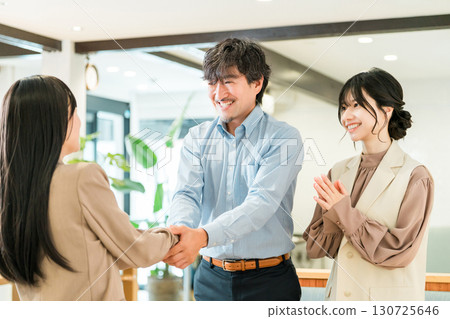 Businessmen shaking hands to greet, introduce themselves and conclude a contract in a corporate office Businessmen shaking hands to greet, introduce themselves and conclude a contract in a corporate office 130725646