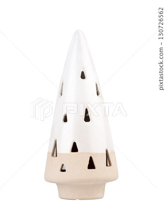A modern, minimalist ceramic Christmas tree with geometric cutouts, isolated on a white background, representing a contemporary holiday decoration. A modern, minimalist ceramic Christmas tree with geometric cutouts, isolated on a white background, representing a contemporary holiday decoration. 130726562